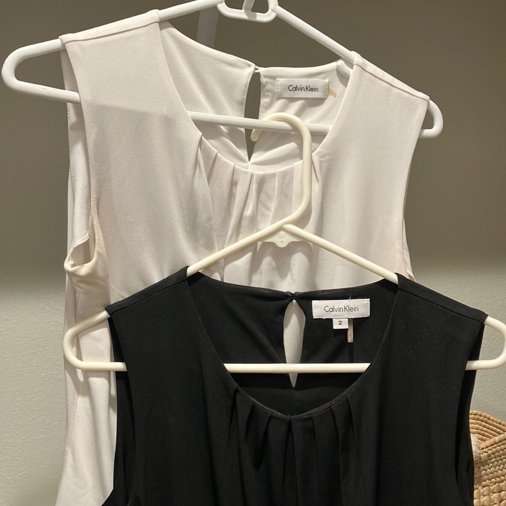 Two Calvin tops
